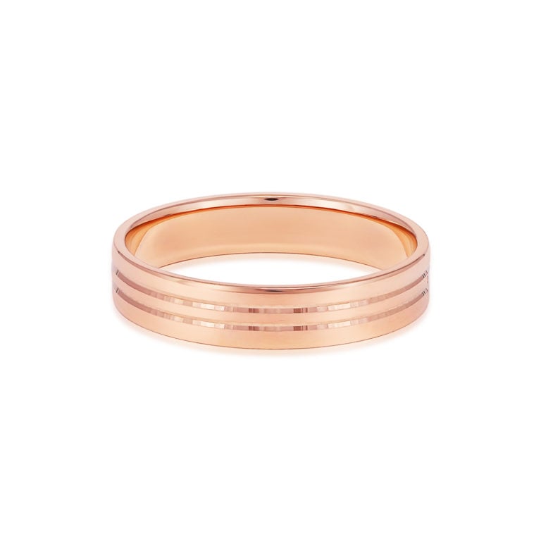 SK mens wedding rings in 14k rose gold with three layers of line along the band