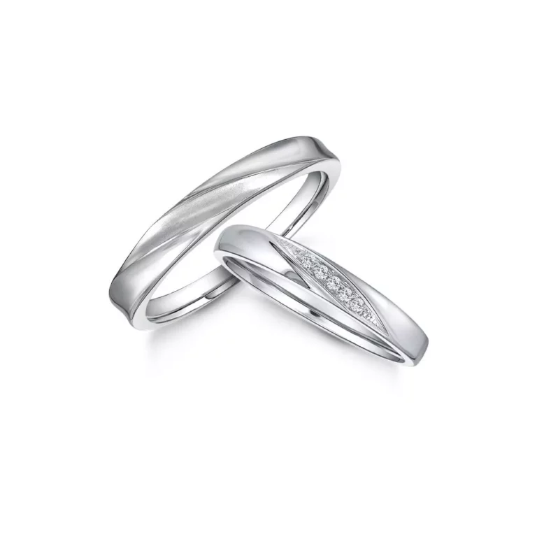 SK couple wedding rings in white gold with diamonds and texture on the band of the ring