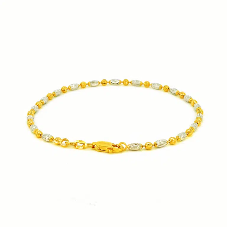 SK BRACELET FOR WOMEN TIDAL GLITZ features oblong shaped beads with wave textures