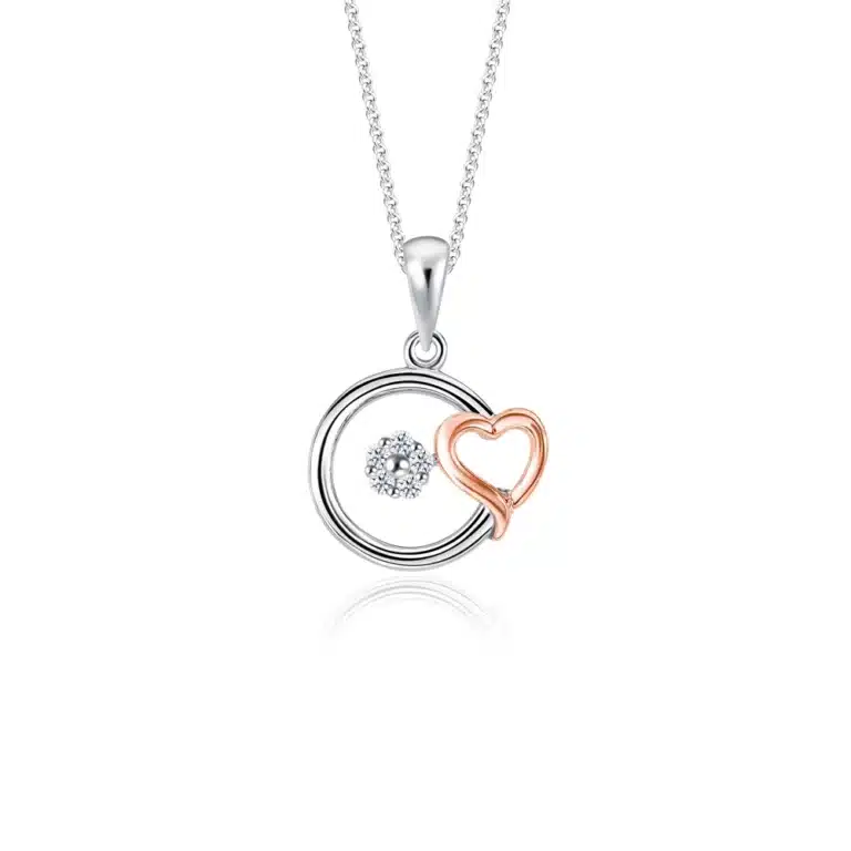 A delicate rose gold necklace pendant featuring a circular white gold frame with a sparkling diamond-like centerpiece on the left. To the right, an elegant rose gold heart is intertwined with the white gold frame, creating a romantic and stylish design.