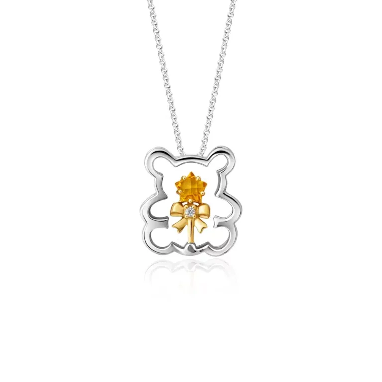 SK diamond necklace with an outline of a teddy bear in white gold and a flower inside