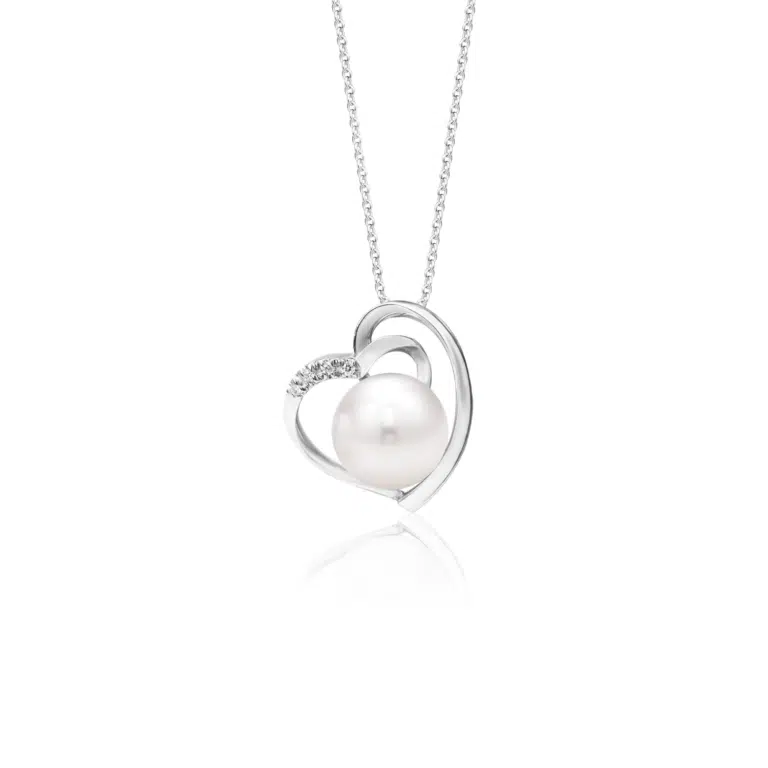 SK heart necklace featuring a freshwater pearl cradled within a heart shaped design accented with lab grown diamonds in 10k white gold