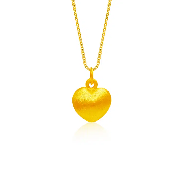 SK heart necklace crafted in 999 gold material featuring a classic heart shape with a textured matte finish