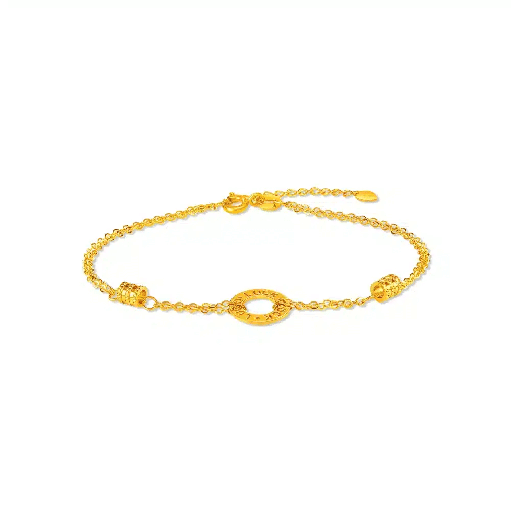gelang tangan emas 916 dengan pesona bulat yang berukir