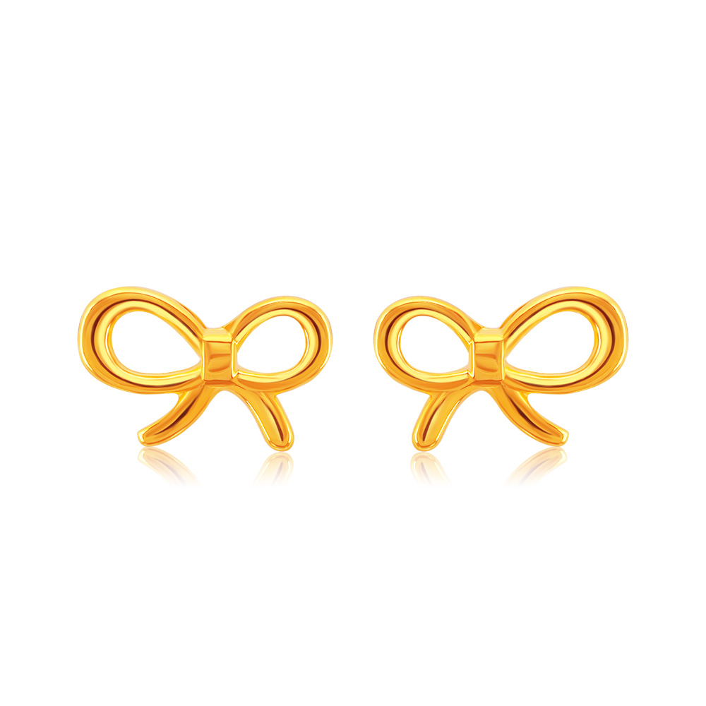 SK 916 Classic Ribbon Gold Stud Earrings in yellow gold, featuring a delicate ribbon-shaped design with butterfly backings