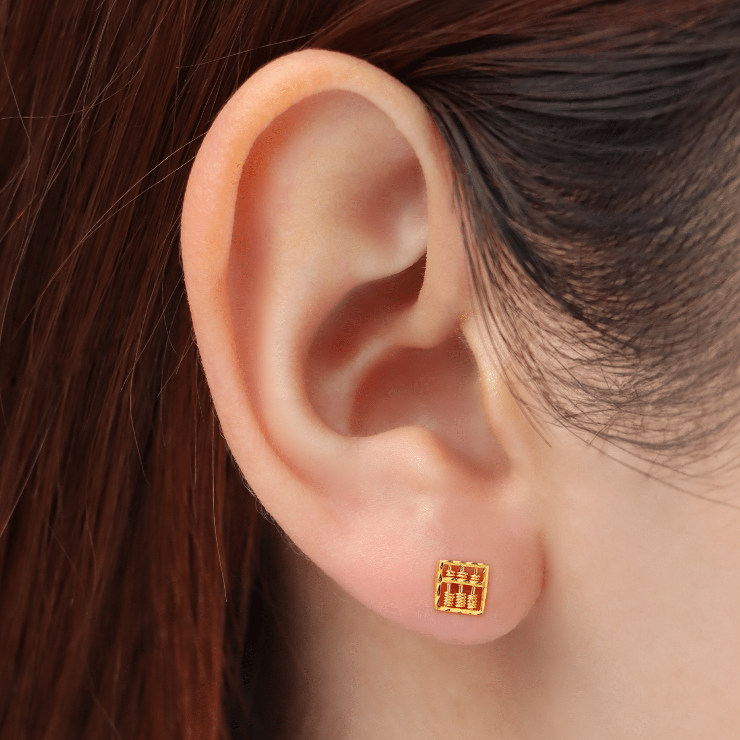 women wearing Classic Rectangular Abacus 916 Gold Stud Earrings in yellow gold, featuring a traditional abacus design with moveable bead details and butterfly backings