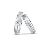MOMENTO MY ONE TRUE LOVE WEDDING BAND Set in 18k white gold. Women's wedding band has a 0.1 carat diamond and men's wedding band has a 0.05 carat diamond.
