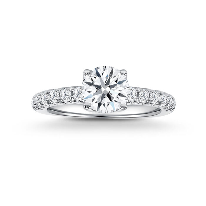 Star Carat Starlight diamond solitaire is set in an elegant row of paved diamonds in 18K white gold