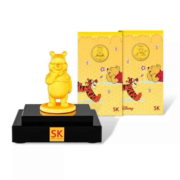Winnie the Pooh Bear 999 Pure Gold Figurine with Winnie the Pooh and Tigger 999 Pure Gold Coins.