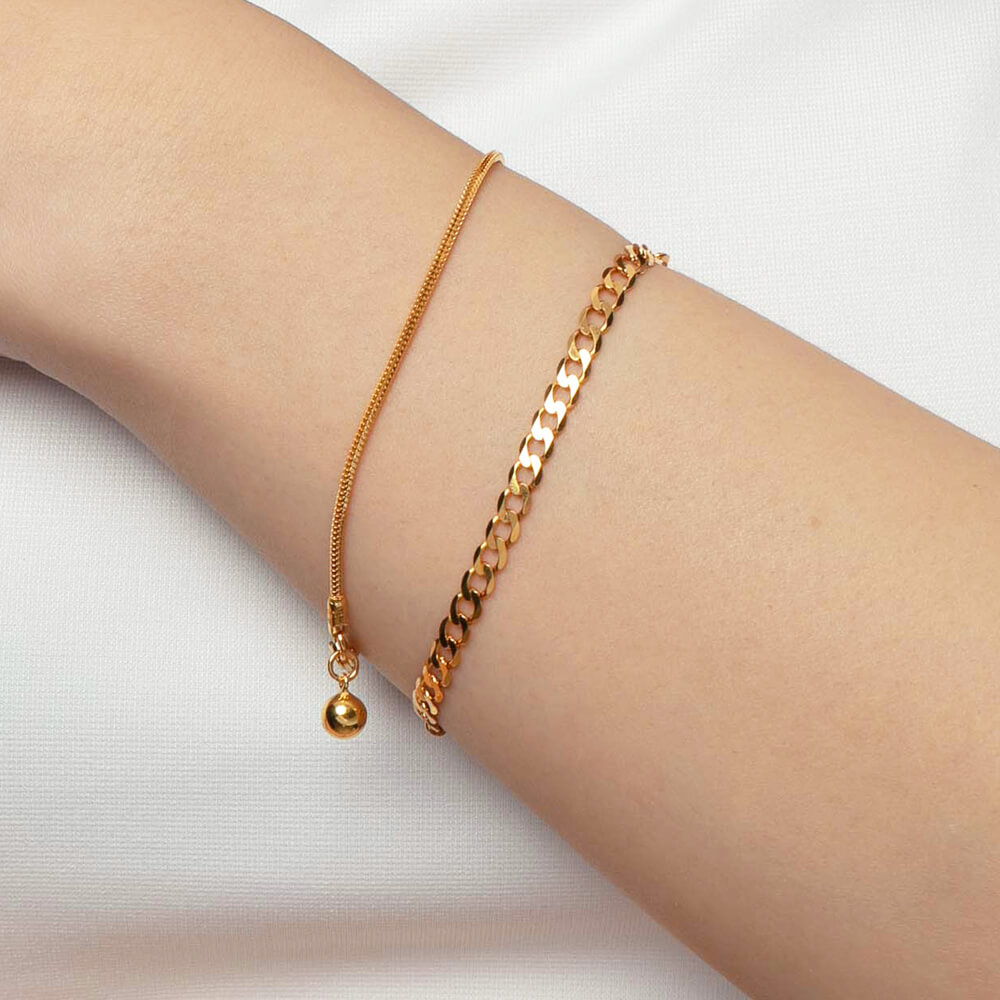 SK BRACELET FOR WOMEN BOA BELL a sleek piece with an added bell made in 916 gold