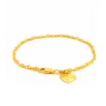 SK BRACELET FOR WOMEN CLASSIC WAVE crafted with 916 gold with a love shaped charm for everyday wear